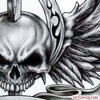 skull angel wings tattoo